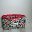 MONEDERO FLORES INTERIOR.webp