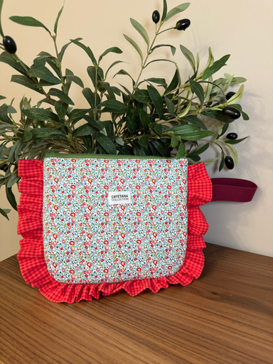 Bolso mano con volante 